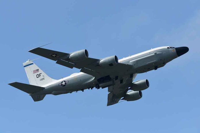 1274771608 featured image Military aircraft flying in clear blue sky.