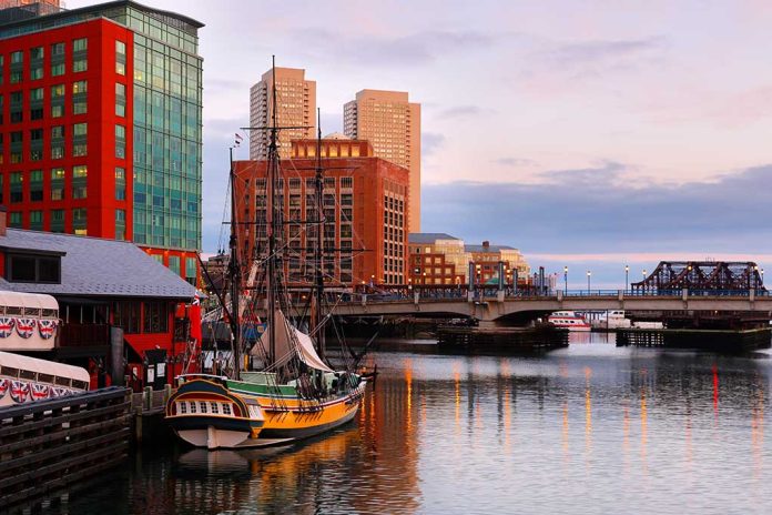 1600361866 featured image Historic ship docked near modern buildings at sunset.