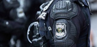 Seattle police officer in protective gear.