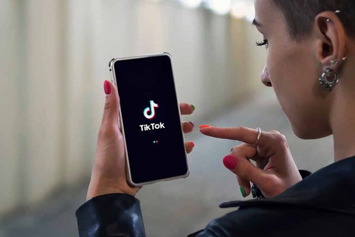 1795552729 featured image Person using TikTok app on smartphone