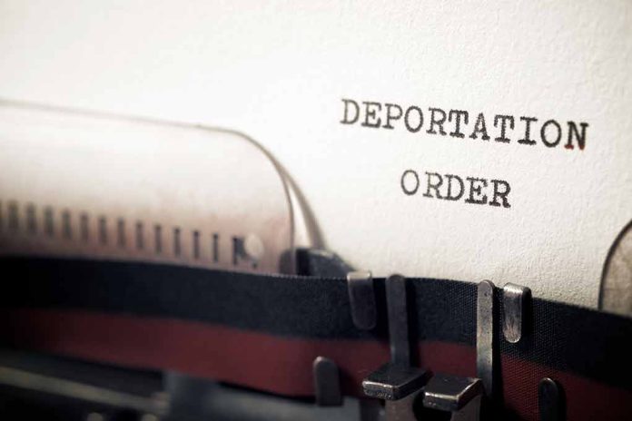 1931733599 featured image Typewriter with "Deportation Order" typed on paper.