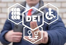 Person pointing at diversity equity inclusion symbols
