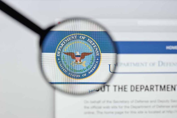 1168986508 featured image Magnifying glass over Department of Defense logo.