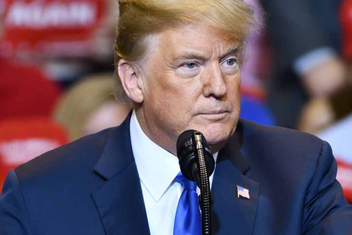 1177917220 featured image Man speaking at a rally in blue suit