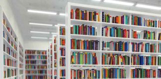 Modern library with rows of colorful bookshelves.