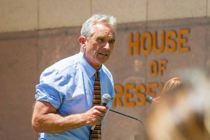 1401970814 featured image Man speaking into microphone outside building