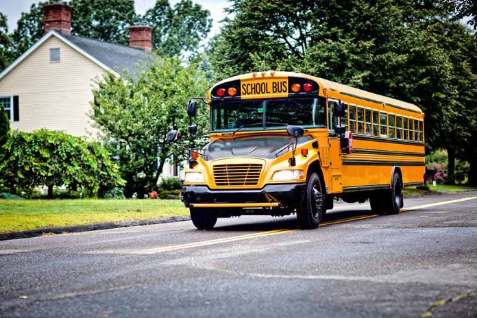 153646226 featured image Yellow school bus driving on suburban road
