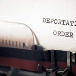 Deportation order typed on vintage typewriter paper