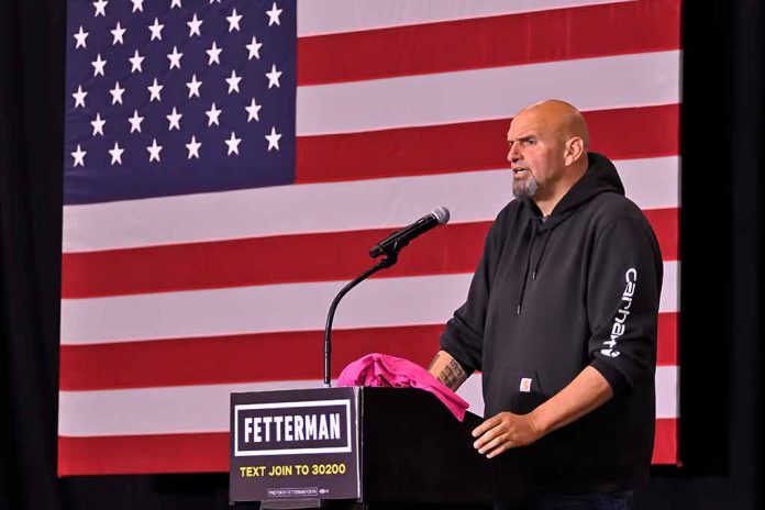 2206788177 featured image Person speaking at podium with American flag backdrop
