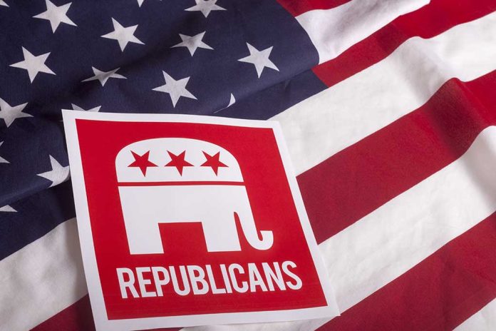 305852243 featured image Red Republican elephant sign on U.S. flag.
