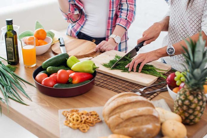 349133213 featured image People preparing fresh vegetables in kitchen.