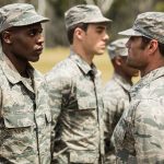 Revamped Military Fitness Standards: Balancing Equality with Combat Readiness Soldiers standing in line during outdoor inspection