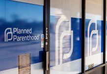 Planned Parenthood office entrance with logo and signs