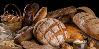 Assorted breads with seeds and baking ingredients