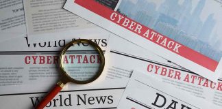 Newspapers with Cyber Attack headlines and a magnifying glass