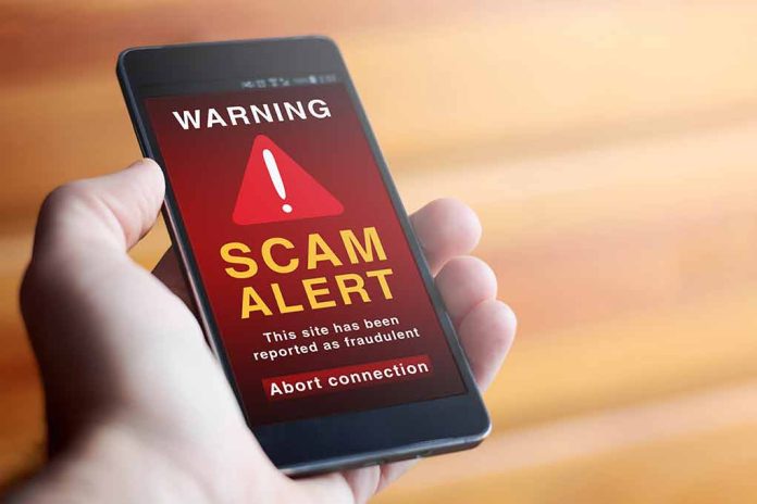 1927116176 featured image Phone showing scam alert warning message