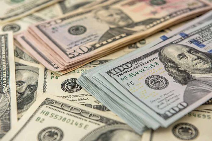 1936085086 featured image Stacks of various U.S. dollar bills.
