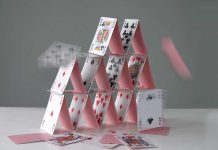 Collapsing house of cards in motion