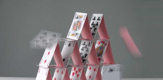 Collapsing house of cards in motion