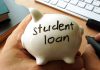 Person holding piggy bank labeled student loan