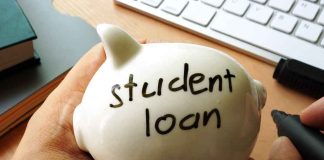 Person holding piggy bank labeled student loan