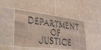 Department of Justice sign on a building