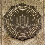 FBI seal on granite wall