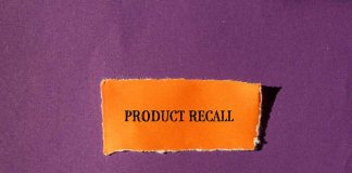 Product Recall text on orange paper, purple background