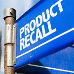 Blue sign with text product recall