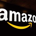 Amazon logo with yellow curved arrow underneath