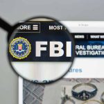 FBI website shown through magnifying glass