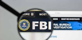 FBI website shown through magnifying glass