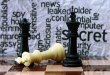 Chess pieces with secretive background text pattern