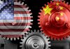 Interlocking gears with USA and China flags