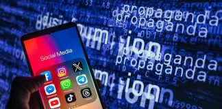 Smartphone showing social media apps with text background