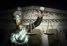 Blindfolded Lady Justice with scales, Supreme Court background