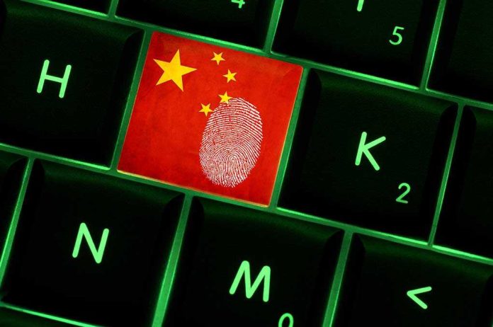 shutterstock_240941041.jpg Close up of a keyboard key featuring the Chinese flag and a fingerprint