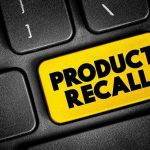 Massive KIA Recall – Parts Flying Off Black keyboard with "Product Recall" yellow key.