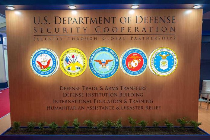 U.S. Department of Defense Security Cooperation display with logos.