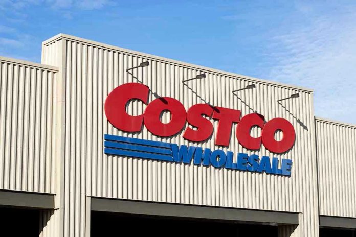 2080639498 Costco Wholesale building exterior with prominent logo sign.