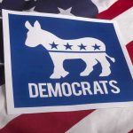 Democrat Alderman BLASTS Governor, Slams Colleagues! Democrats logo on American flag background