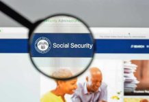 Magnifying glass focusing on Social Security Administration webpage.