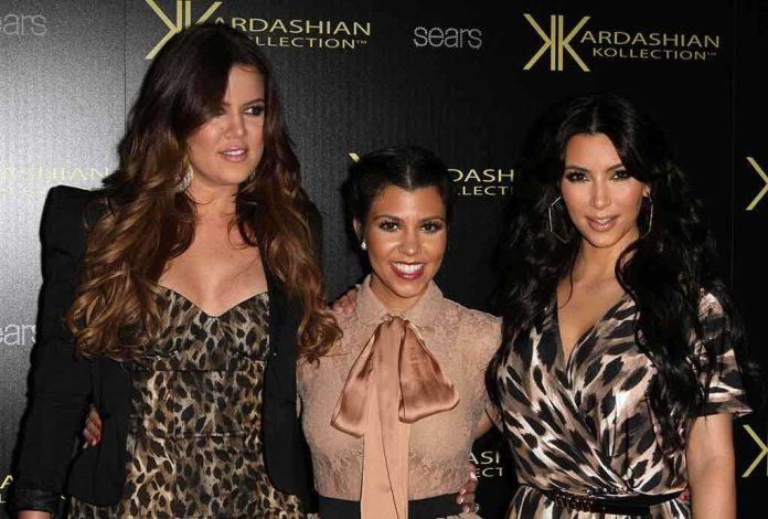 shutterstock_83848762.jpg Three Kardashian sisters posing together at a fashion event