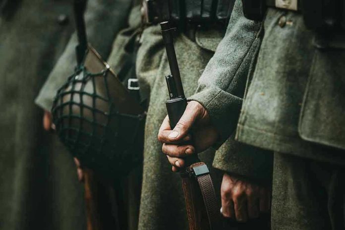 Soldiers in uniform holding rifles and grenades.