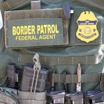 Border Patrol Boss BUSTED in Harboring Sting Border Patrol vest with gear and communication equipment.