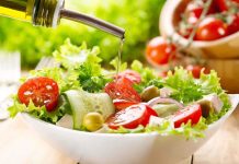SHOCKING Menu Revolution Targets GLP-1 Users Fresh salad being drizzled with olive oil