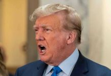 Trump Fires Secretary — Then Discovers Shocking Betrayal Man in suit with open mouth, speaking passionately.