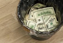 Criminal Illegals Get Rehab— Funded By Taxpayers Trash bin filled with one hundred dollar bills.