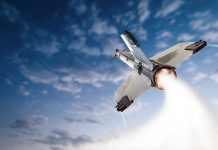 NASA’s Moon Mission Makes EPIC Comeback Rocket launching into the sky with clouds.