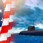 SHOCKING: Navy Can’t Fix $3B Submarine Disaster American flag and submarine at sea under a cloudy sky.